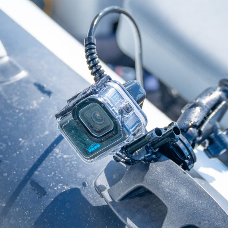 GoPro in a waterproof case with Seavu receiver cable, mounted on the carbon fibre marine pole for underwater inspections