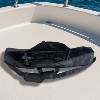 Seavu Seeker Pole Kit bag resting on the deck of a boat with calm ocean in the background