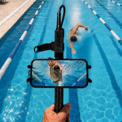 Seeker Pole Kit showing live underwater swimmer footage on a phone during pool coaching.