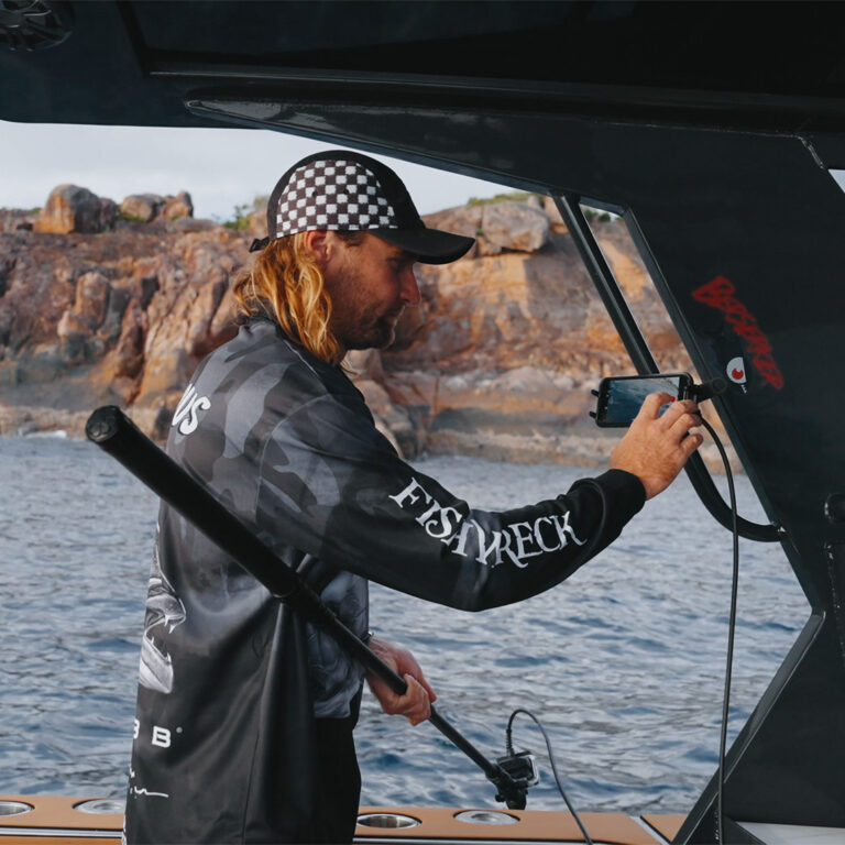Action camera on Seavu Seeker Kit capturing live underwater footage of reef and fish – mobile banner version