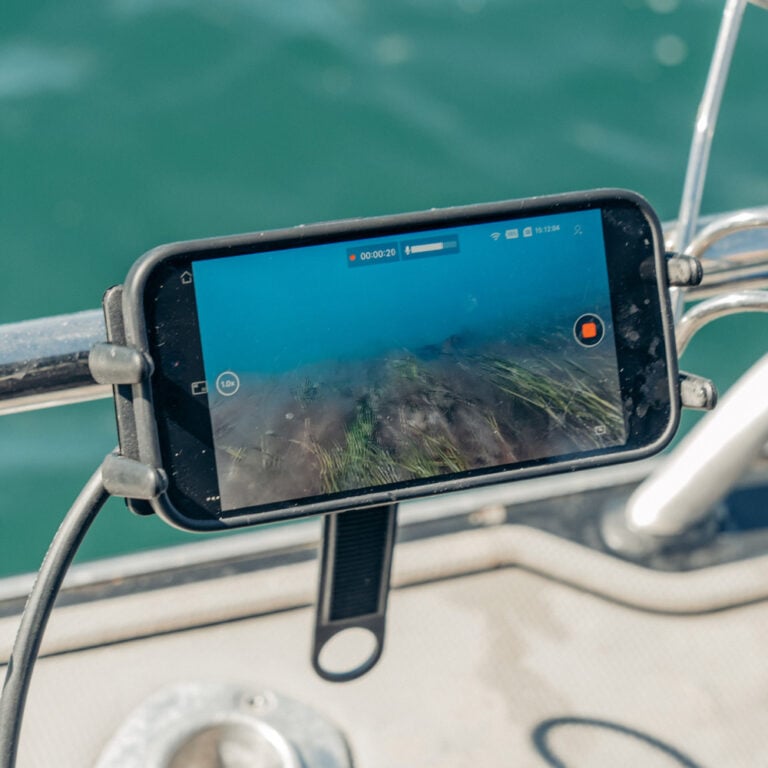 Phone livestreaming underwater footage through the Seavu Seeker Marine Kit using the DJI Mimo app