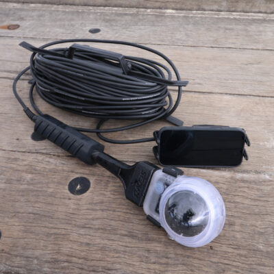 Seavu Orbit 360 Drop Rig with DJI Osmo 360 in a waterproof case, cable reel and phone mount on a timber jetty